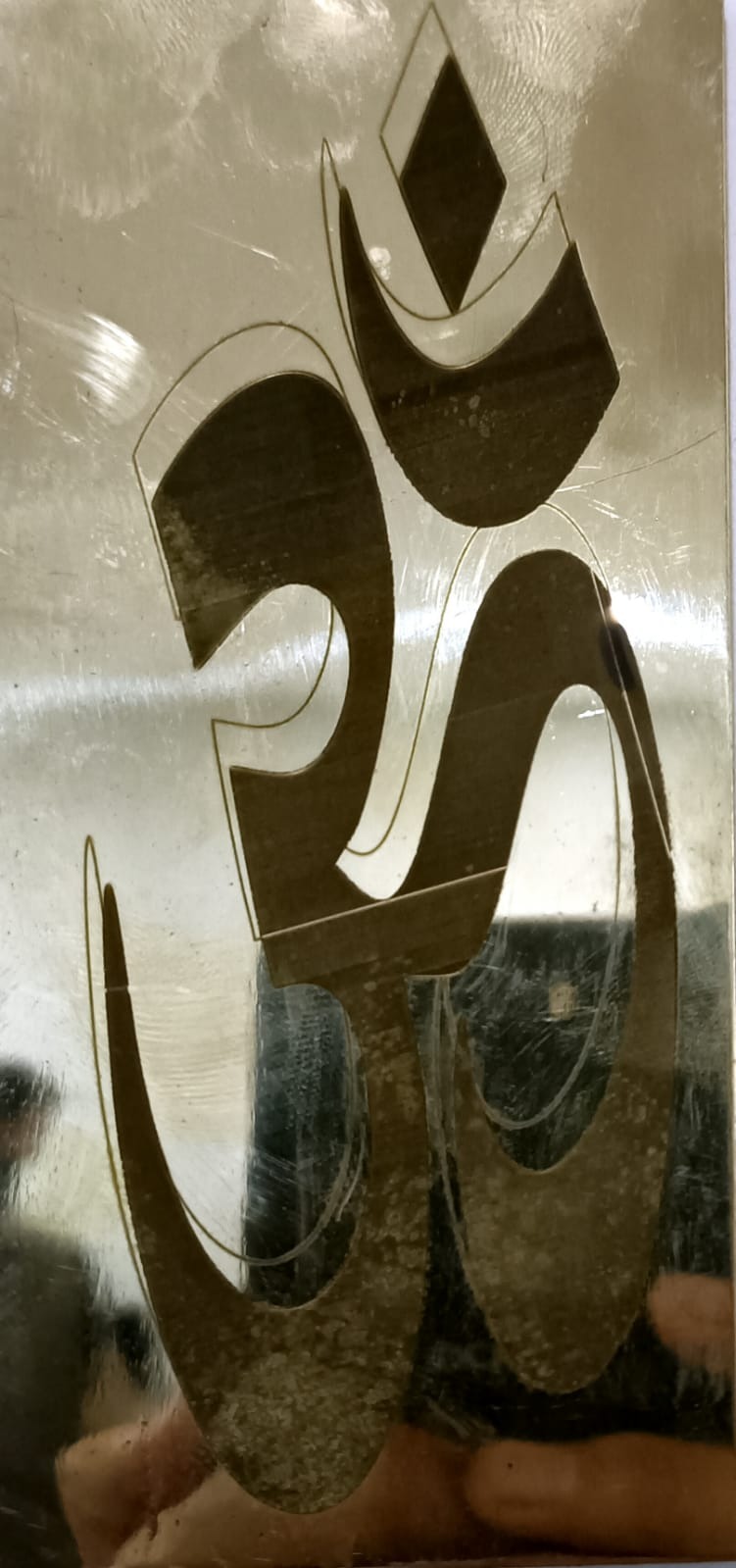Mirror-Polished Om Symbol Art